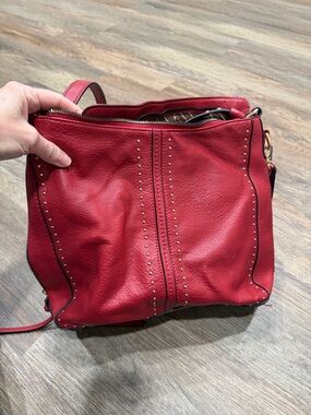 Red Montana West concealed carry purse with removable long shoulder strap.